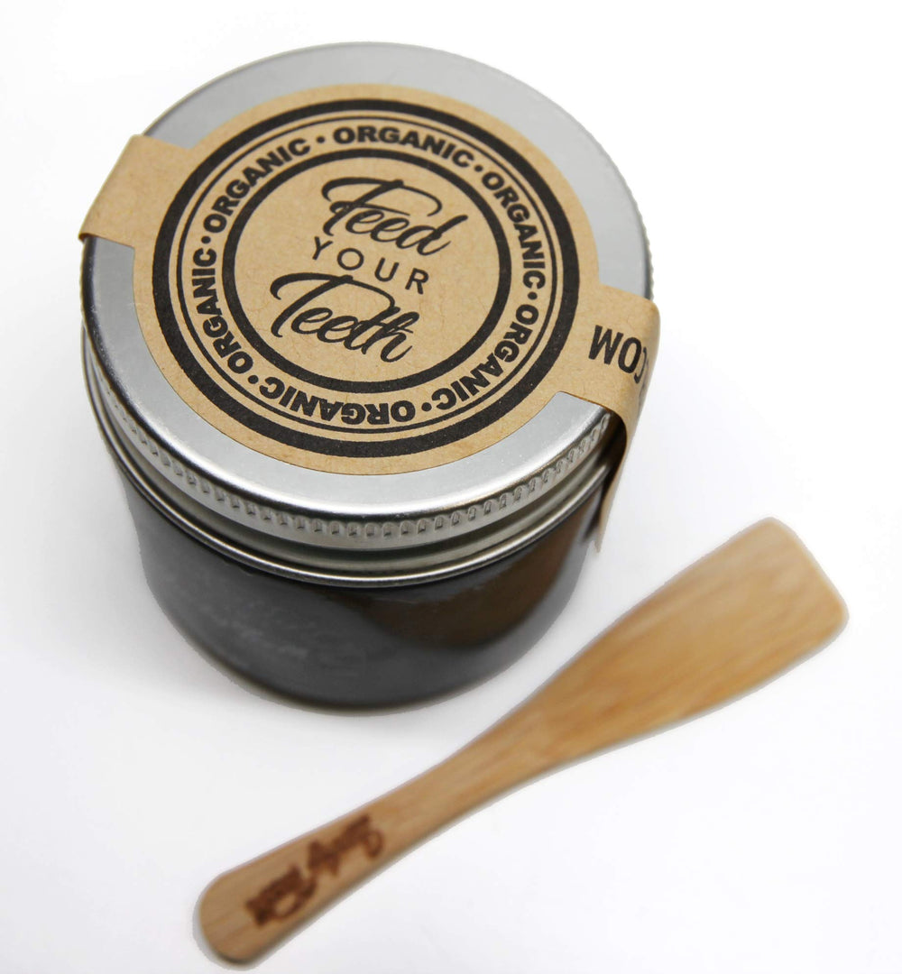 Close-up of toothpaste flavor showing hints of cinnamon, cloves and mint