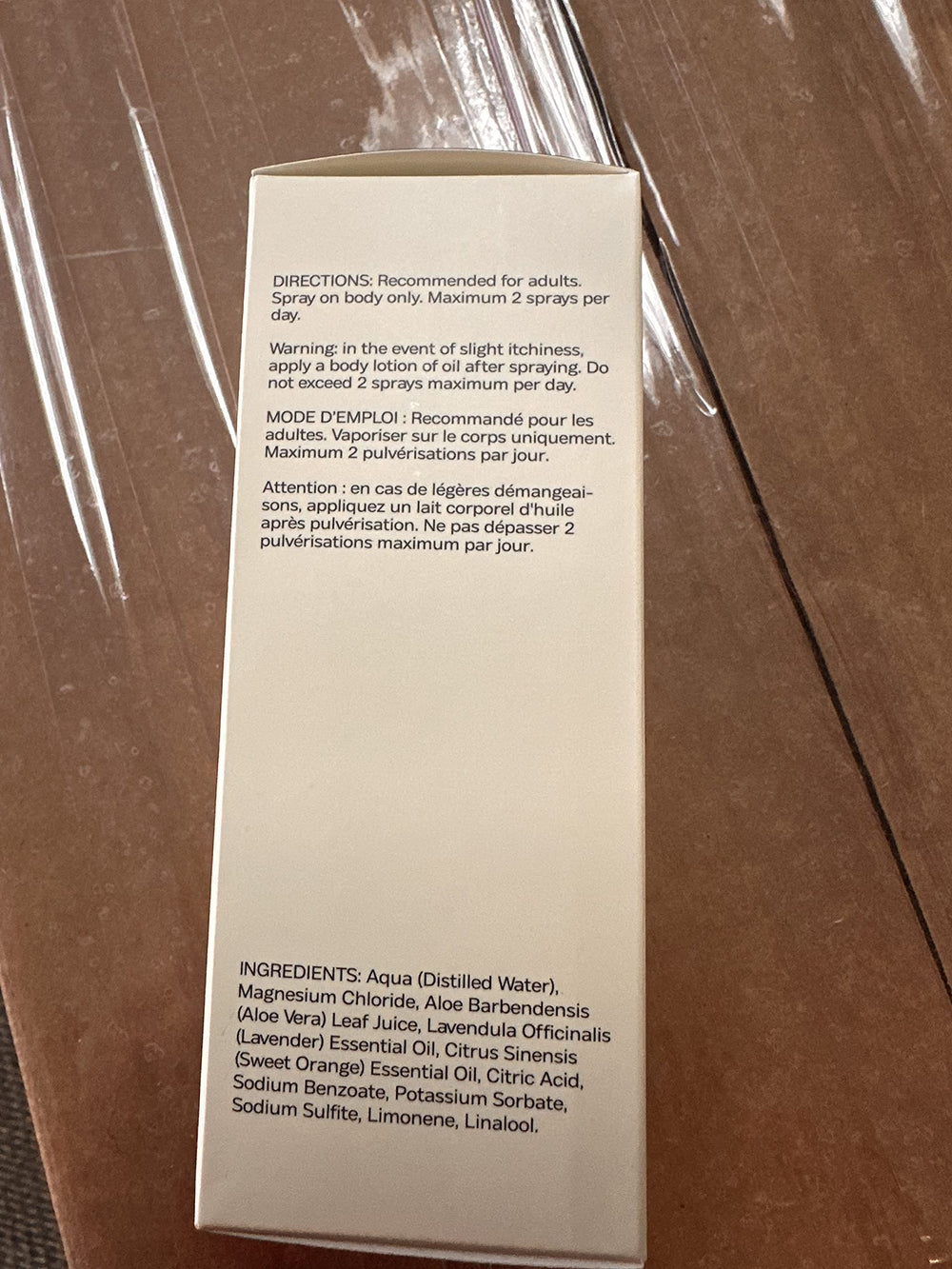 Relaxation scene with bottle of Luna Nectar Nocturne promoting sleep and muscle recovery