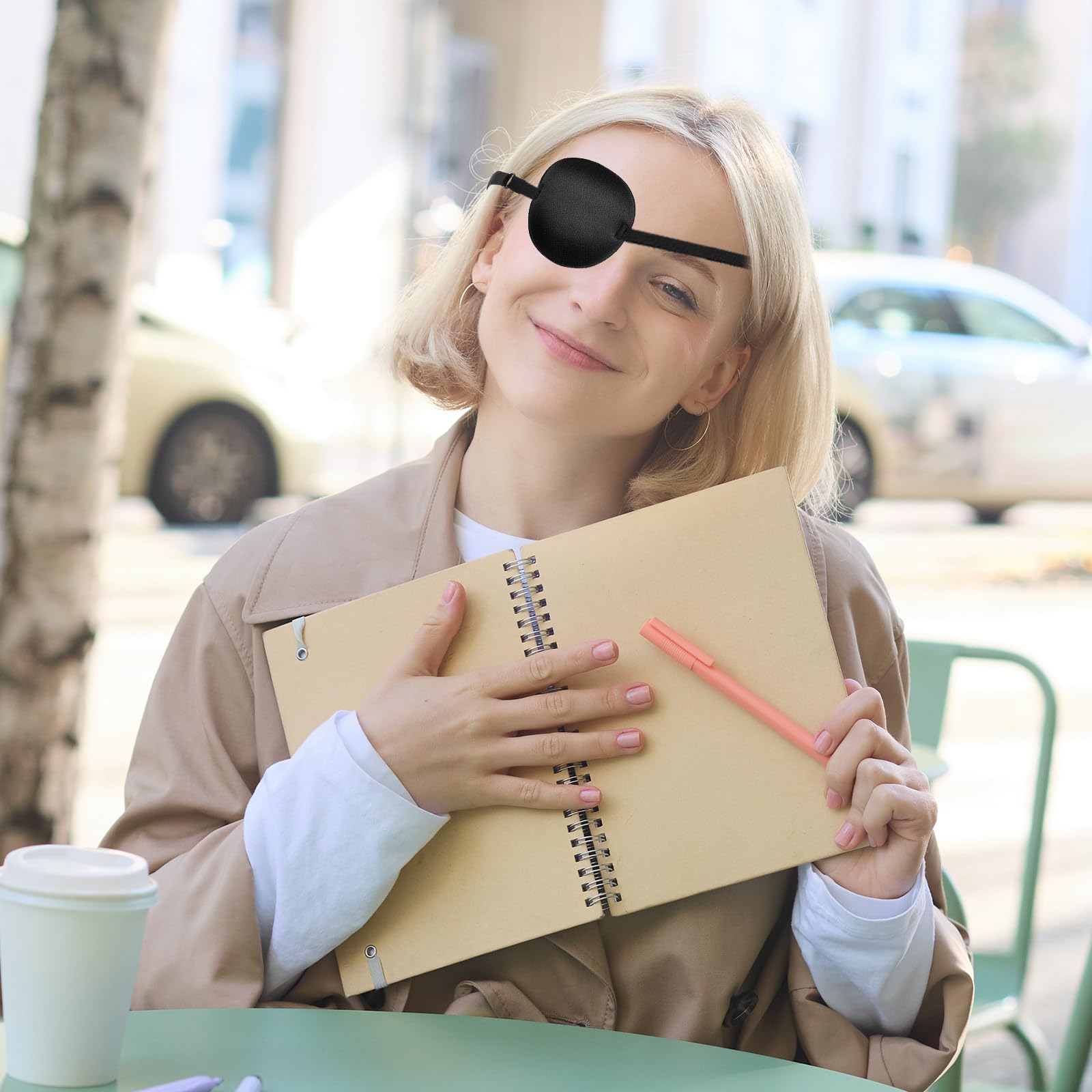 Eye patch covers one eye to block light for amblyopia treatment