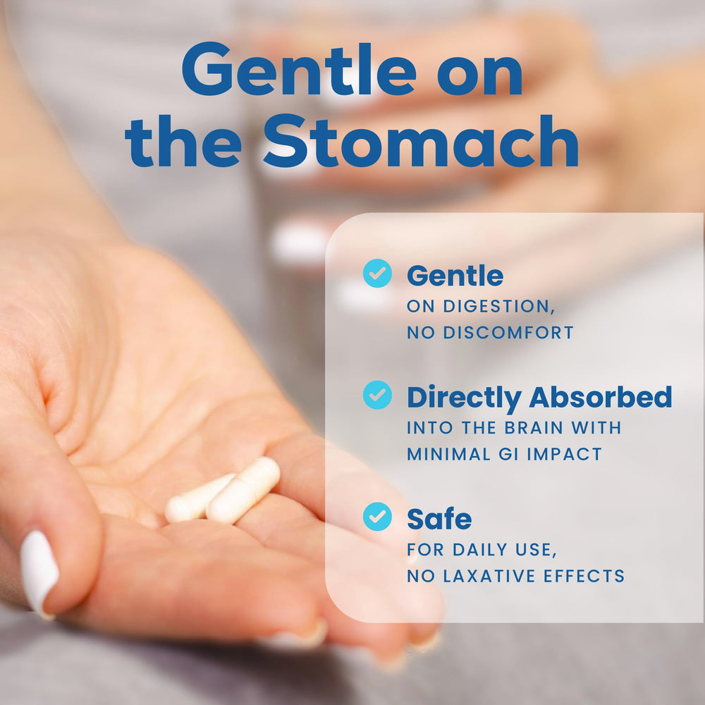 Lifestyle image of the Magtein bottle on a desk with notebook