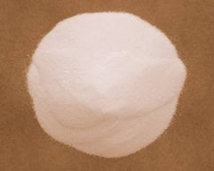 Close-up of very fine MnSO4·H2O powder in a 5 lb bag