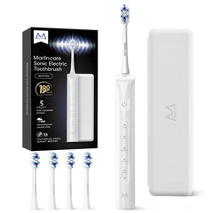 Marlincare electric toothbrush for adults with white handle and four brush heads