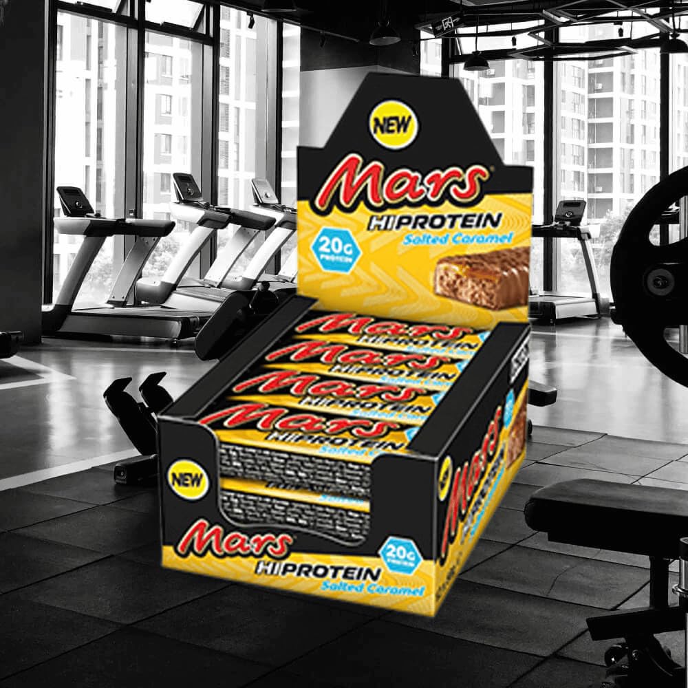 Mars Hi Protein Bar Salted Caramel bar unwrapped reveals chewy center and caramel notes.
