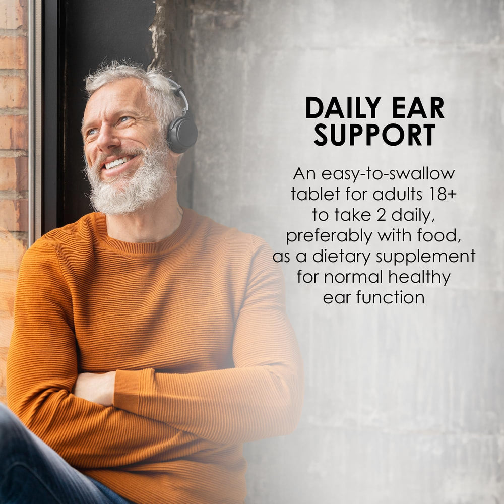 Close-up view of ear health tablets inside the bottle