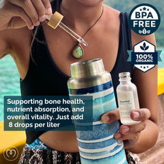 Dropper releasing MAYU mineral drops into water