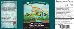 Close-up of Xiao Chai Hu Wan packaging and list of ingredients