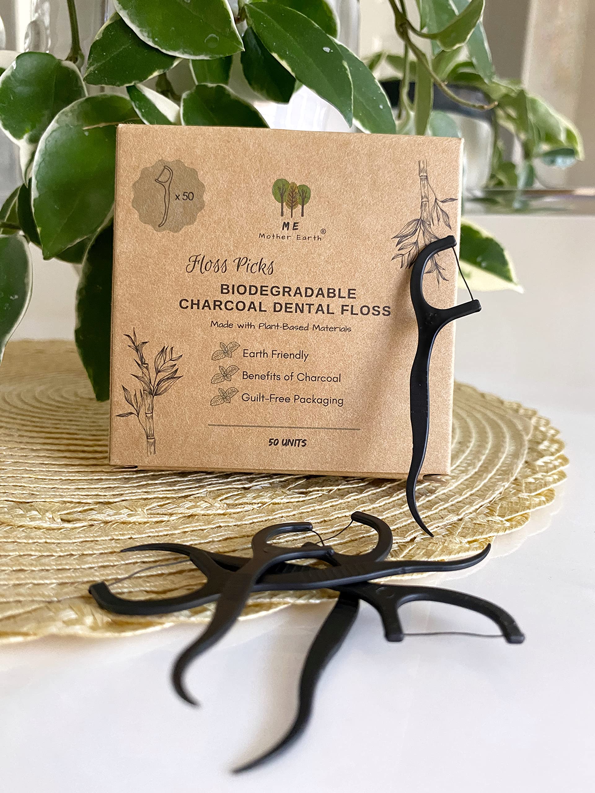 Close-up of bamboo floss with charcoal for plaque removal