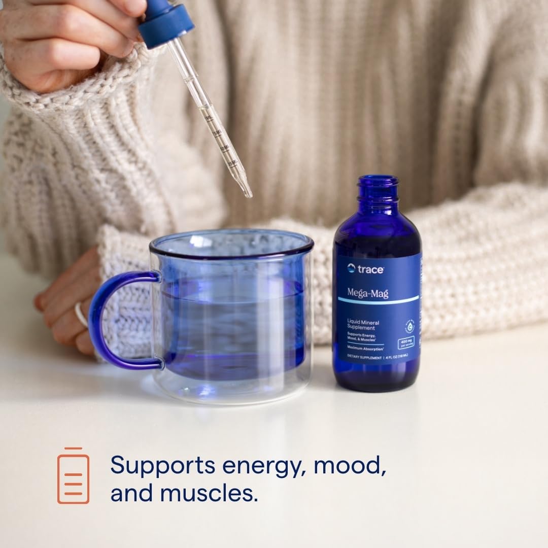 Dropper dispensing Mega-Mag magnesium liquid