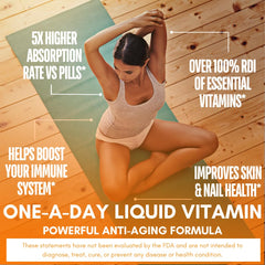 Liquid multivitamin being poured into a glass