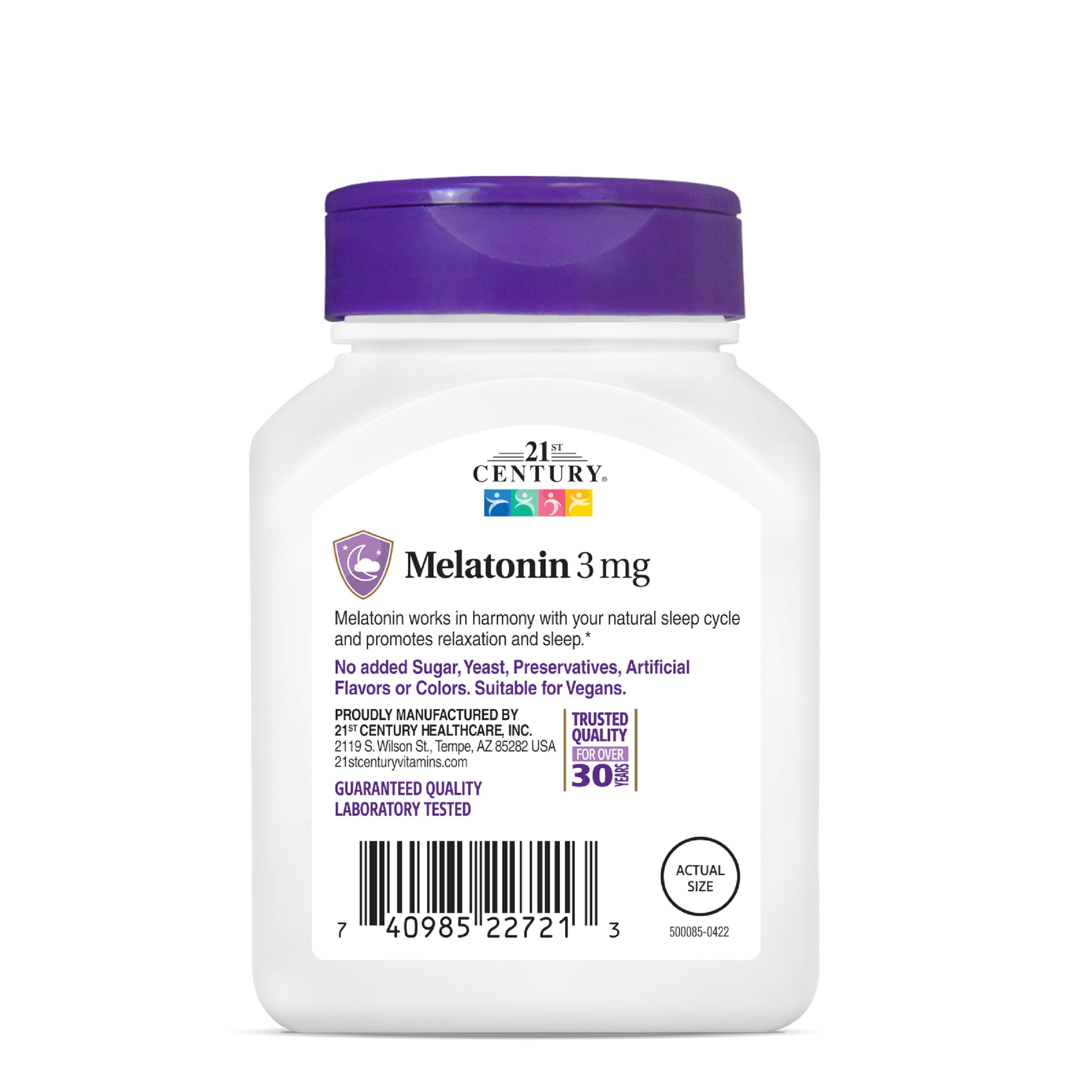 Close-up of melatonin 3 mg tablets inside bottle