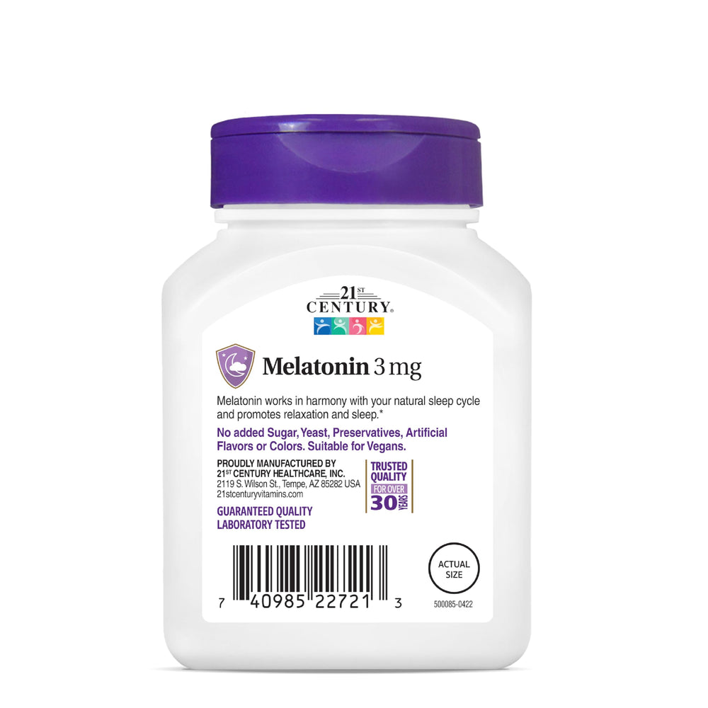 Close-up of melatonin 3 mg tablets inside bottle