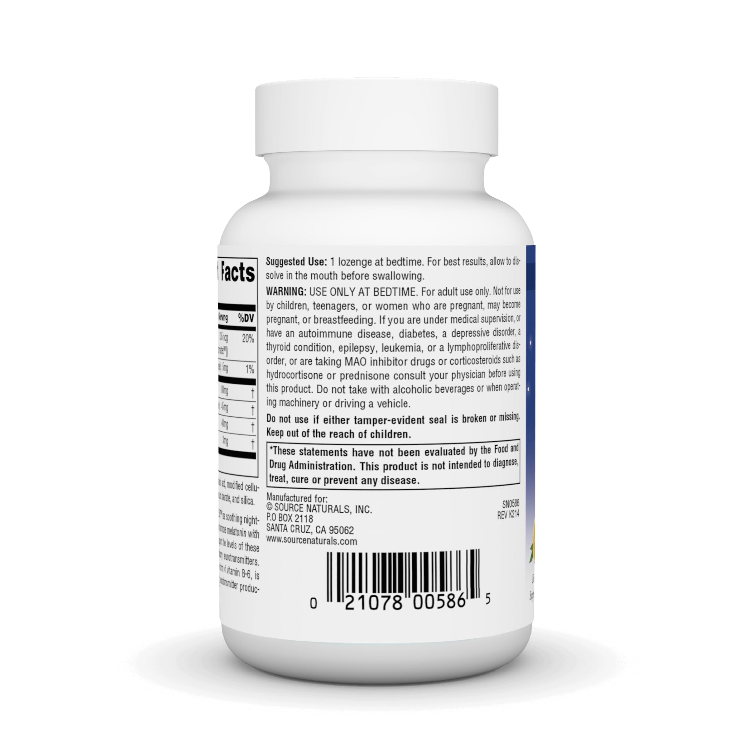 Close-up of an orange melatonin lozenge