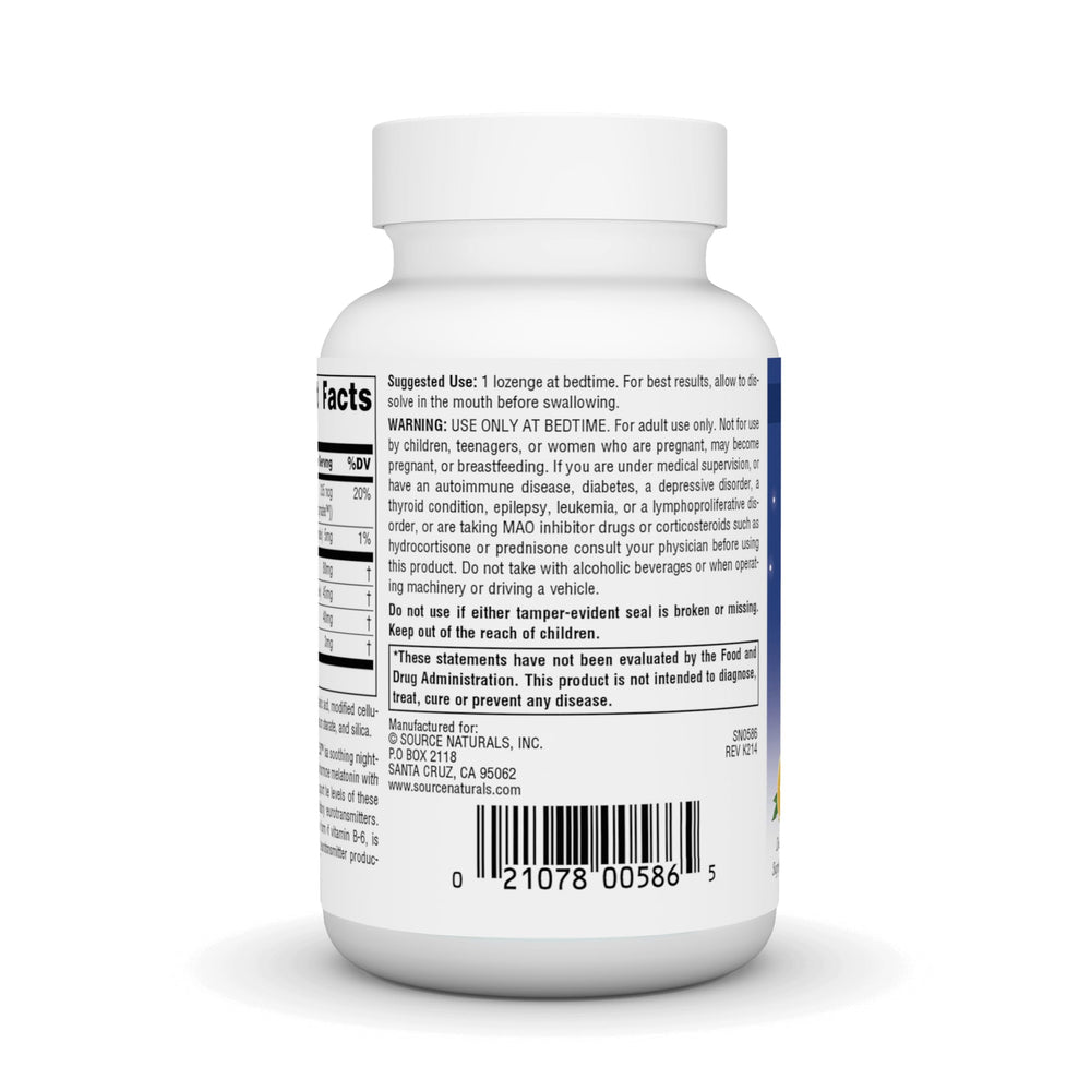 Close-up of an orange melatonin lozenge