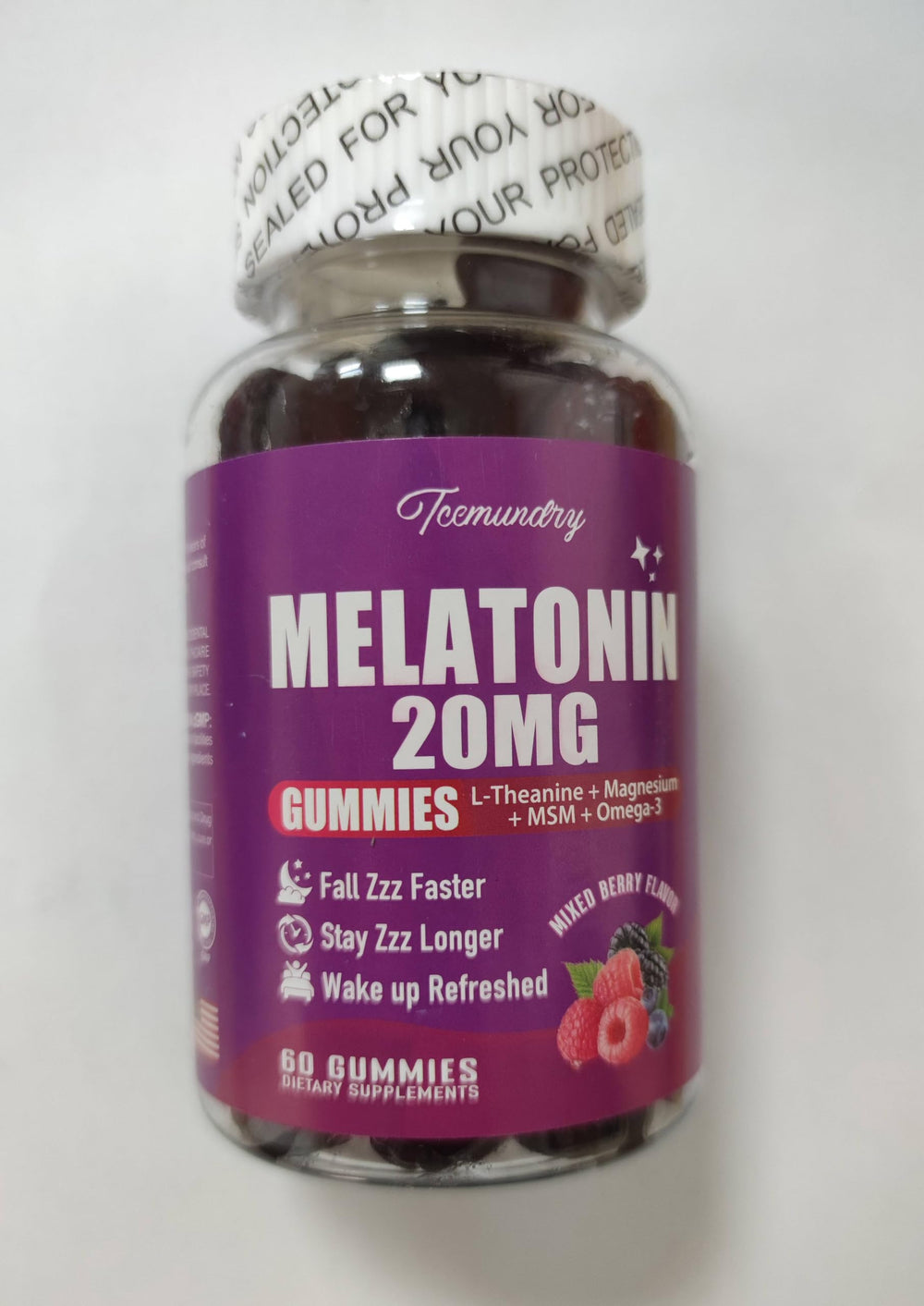 Close-up of a single melatonin gummy with mixed berry flavor