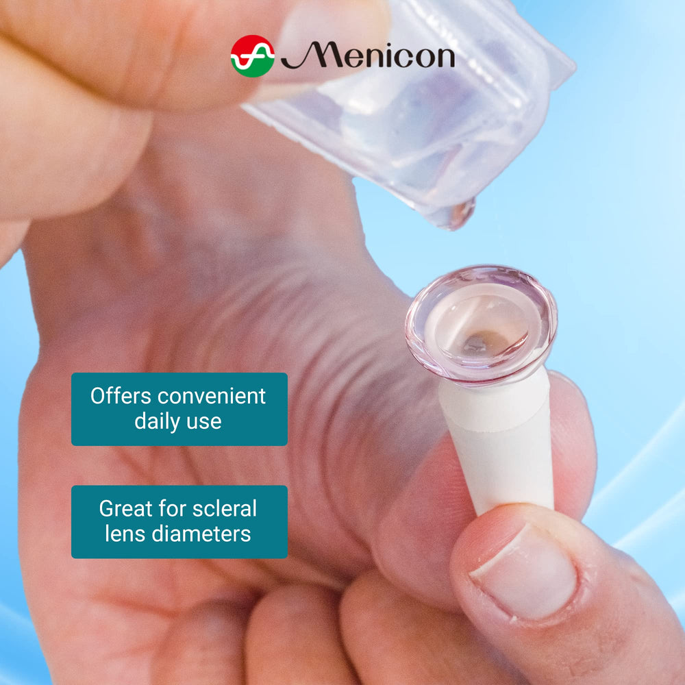 Hand holding a LacriPure 5ml saline contact lens solution vial