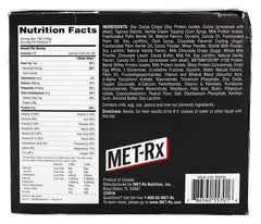 MET-Rx Colossal Cookie Crunch bar unwrap close-up shows cookie-crunch texture.