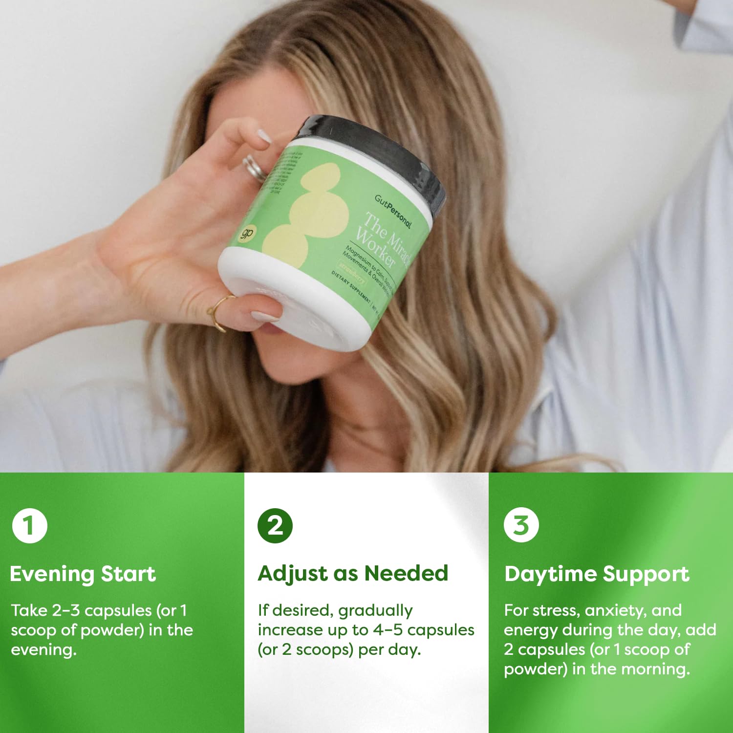 Serving scoop dipped into the strawberry magnesium glycinate powder