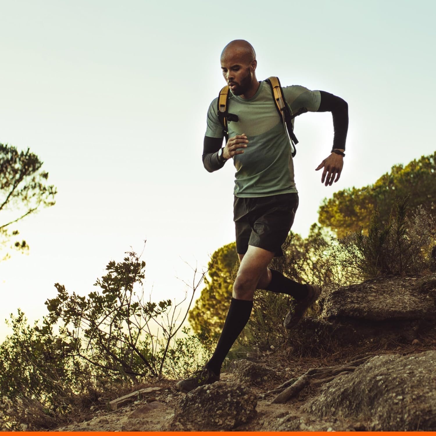 Active adult using Momentous Ashwagandha for alertness and focus