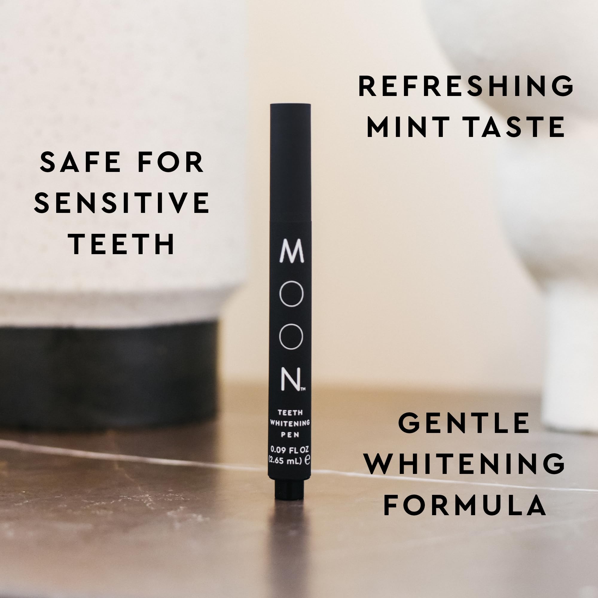 Close-up of MOON Teeth Whitening Pen labeled Vanilla Mint