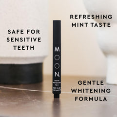 Close-up of MOON Teeth Whitening Pen labeled Vanilla Mint