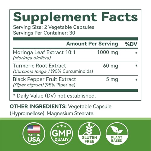 Green superfood concept with moringa capsules on white background