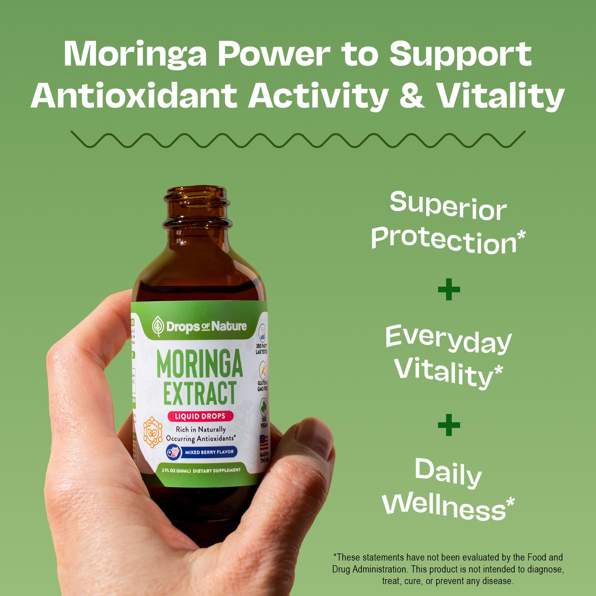 Berry-flavored moringa liquid drops being dispensed from a dropper