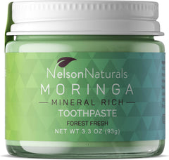 Front view of Moringa Mineral Rich Fluoride Free Toothpaste in a glass jar