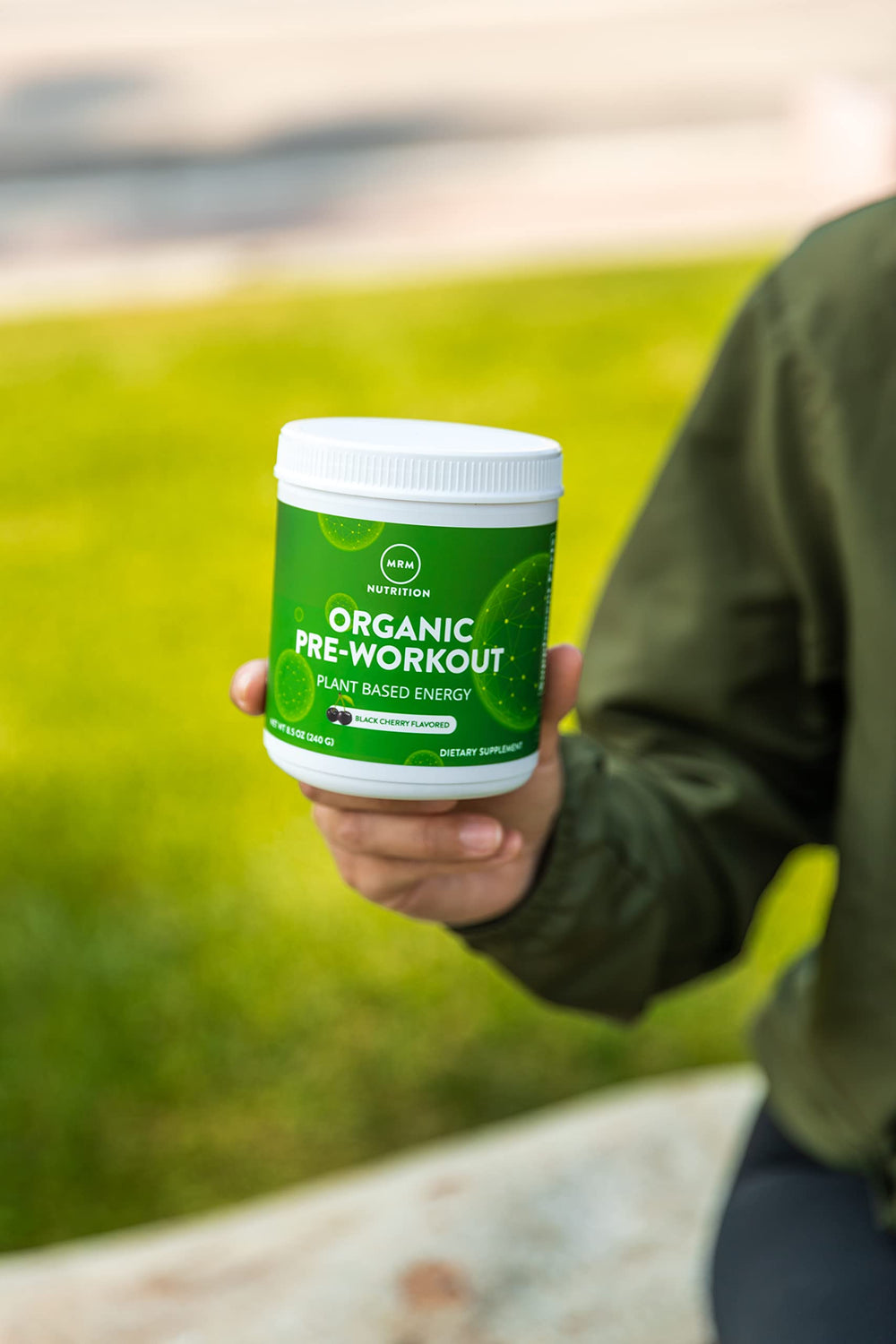 MRM healthy blood flow concept portrayed with nutrients beside workout gear.