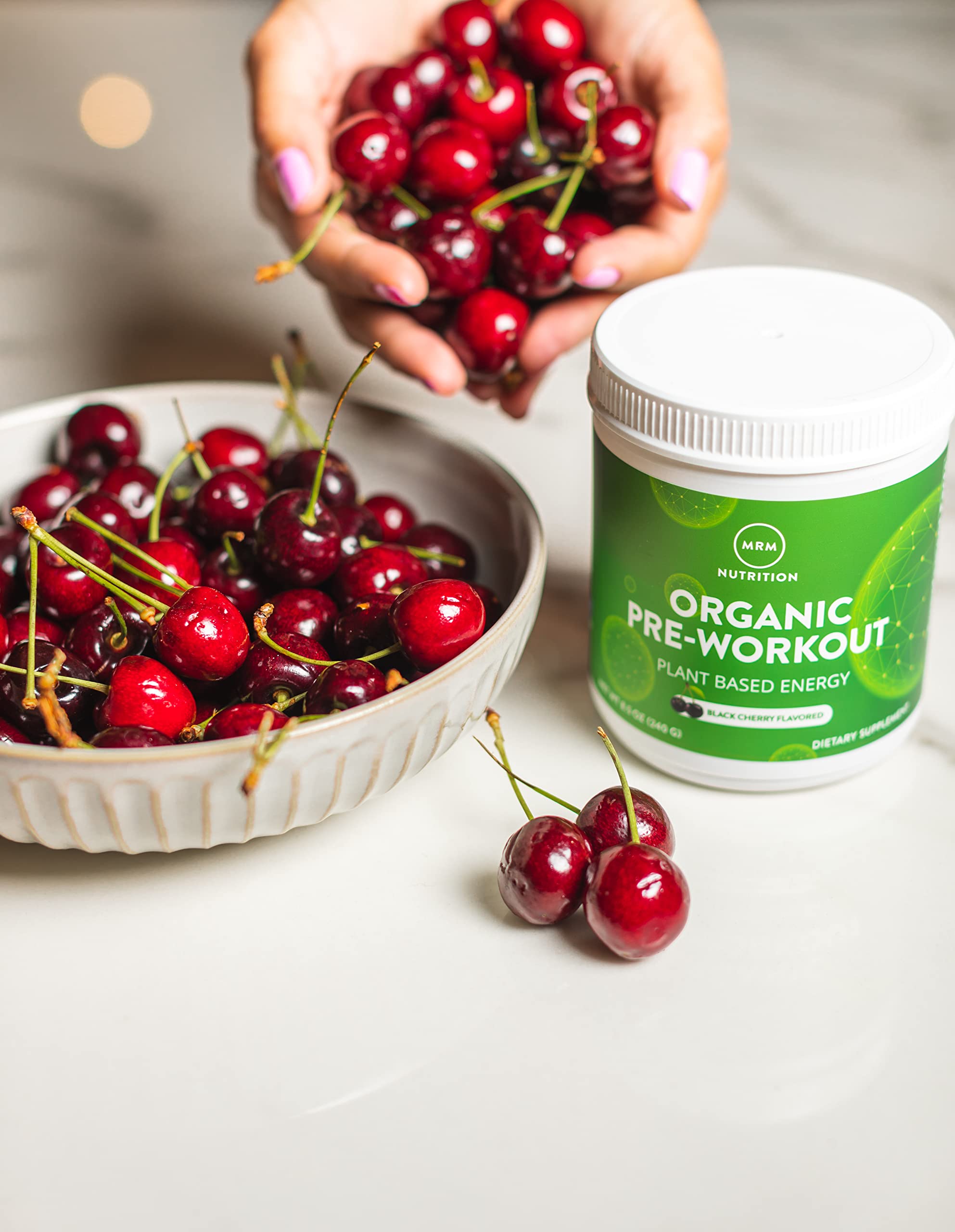 MRM vegan non-GMO label near bottle emphasizes clean ingredients.