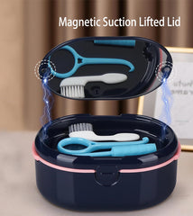 Close-up of denture bath box with drain tray in dark blue