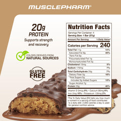 MusclePharm Combat Ready bar closeup, chewy texture with chips for recovery snack.