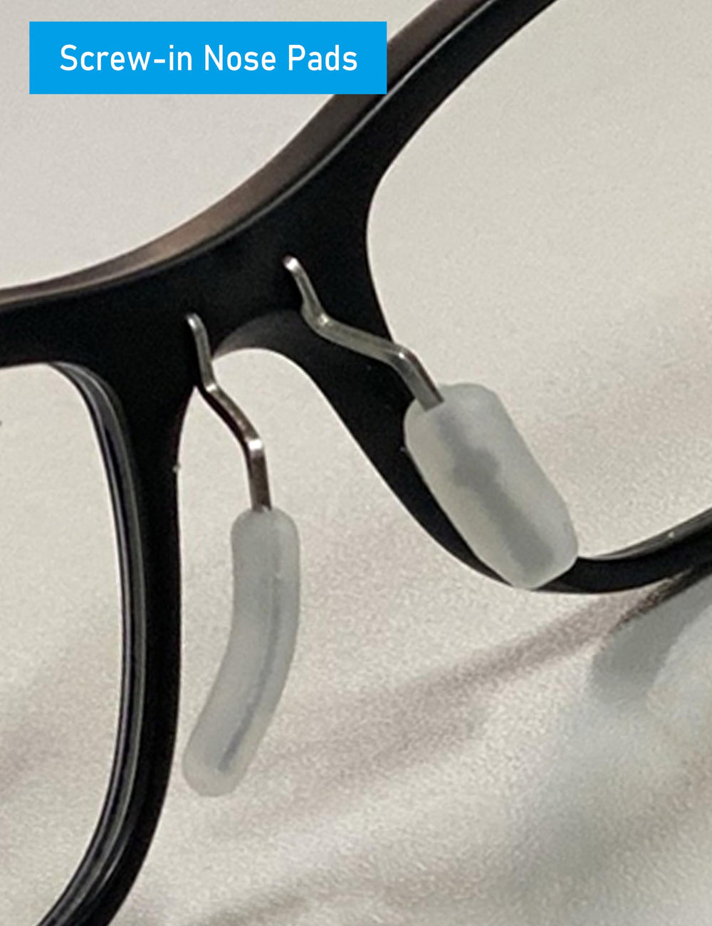 Diagram showing installation of push-in nose pads on glasses