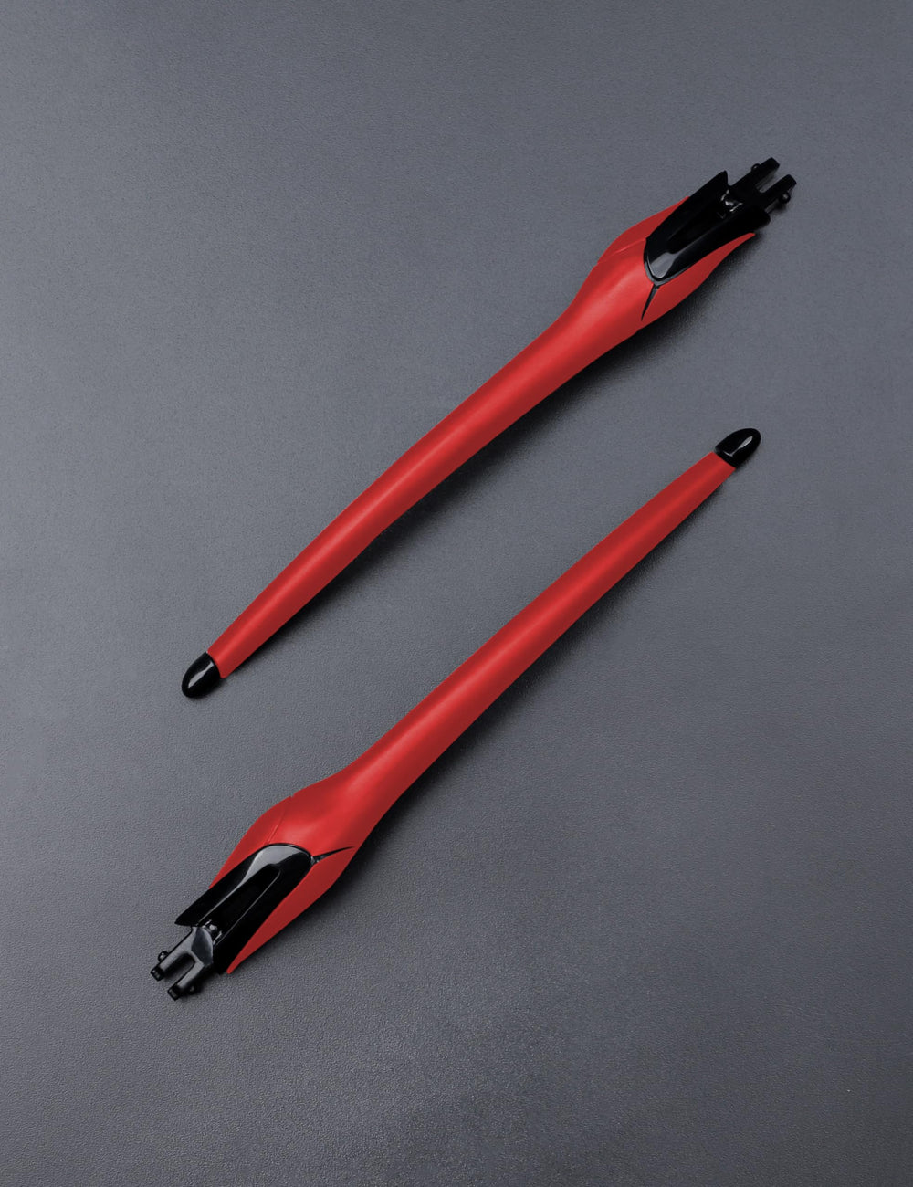 Close-up of MYCOURAG temple arms legs components in black and red