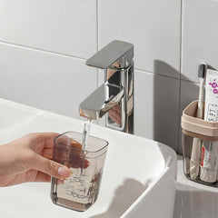 Lid open showing two mouthwash cups inside