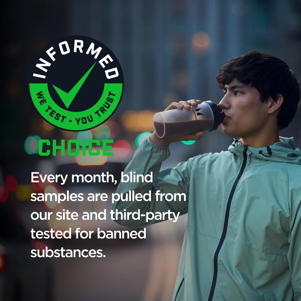 Myprotein Impact Whey Protein Isolate mixed into a glass shows smooth texture