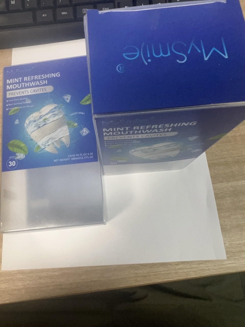 Box showing MySmile mouthwash pack of 60 sachets