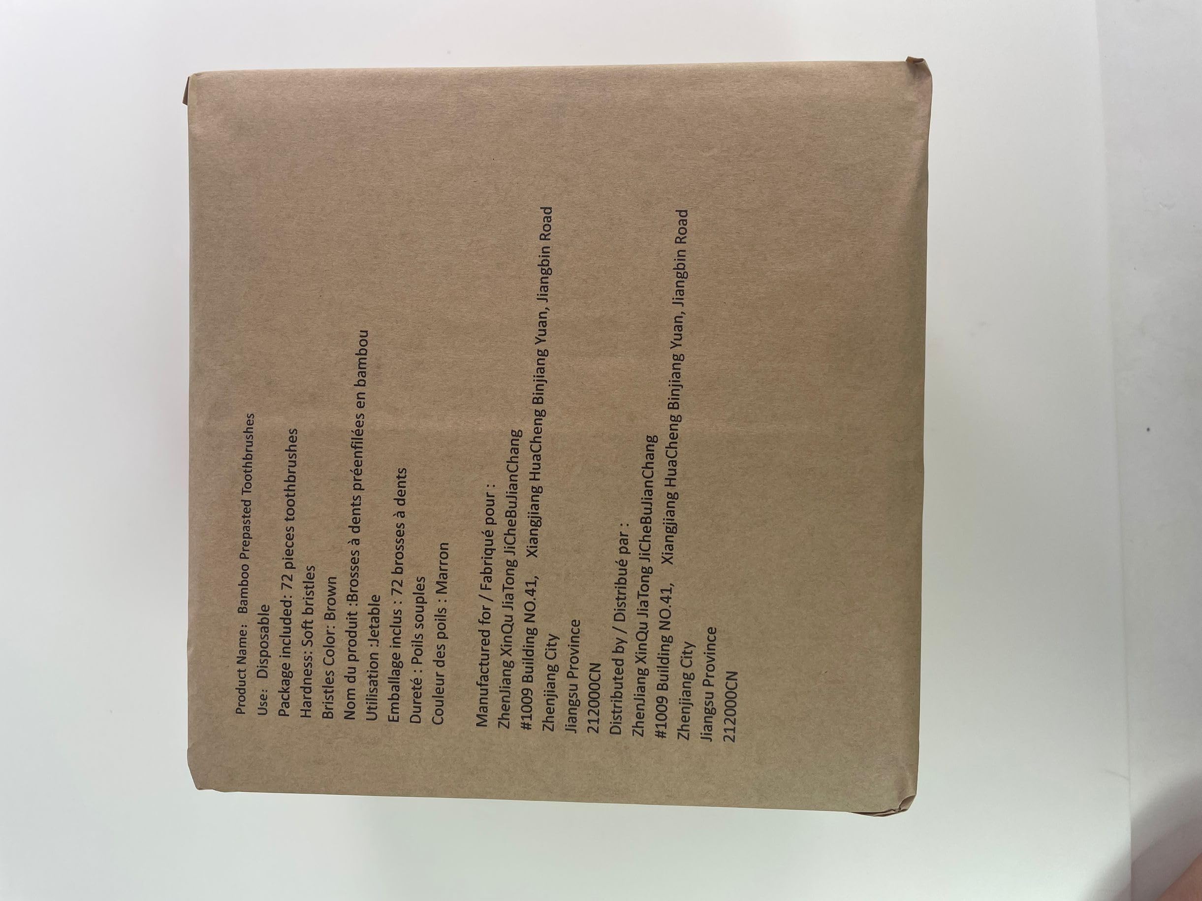 72-piece brown prepasted disposable toothbrushes in paper packaging