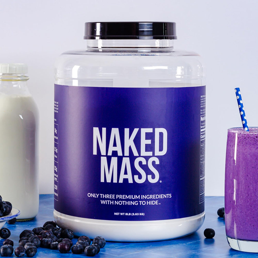 NAKED Mass serving scoop highlights 50g protein and 252g carbs
