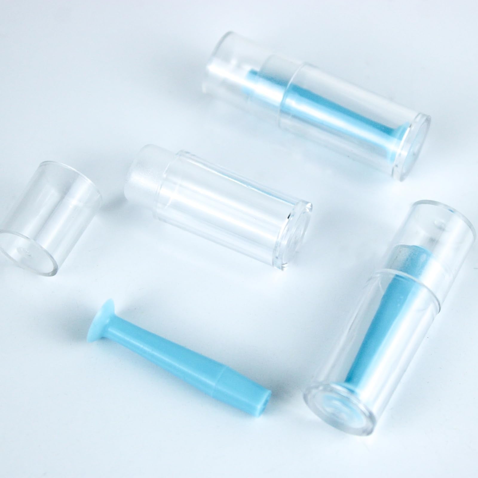 Person using Naturahand lens remover tool on a contact lens