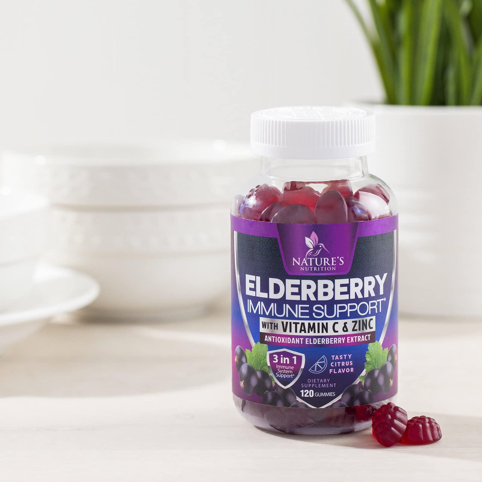 Side view of the bottle with elderberry gummies