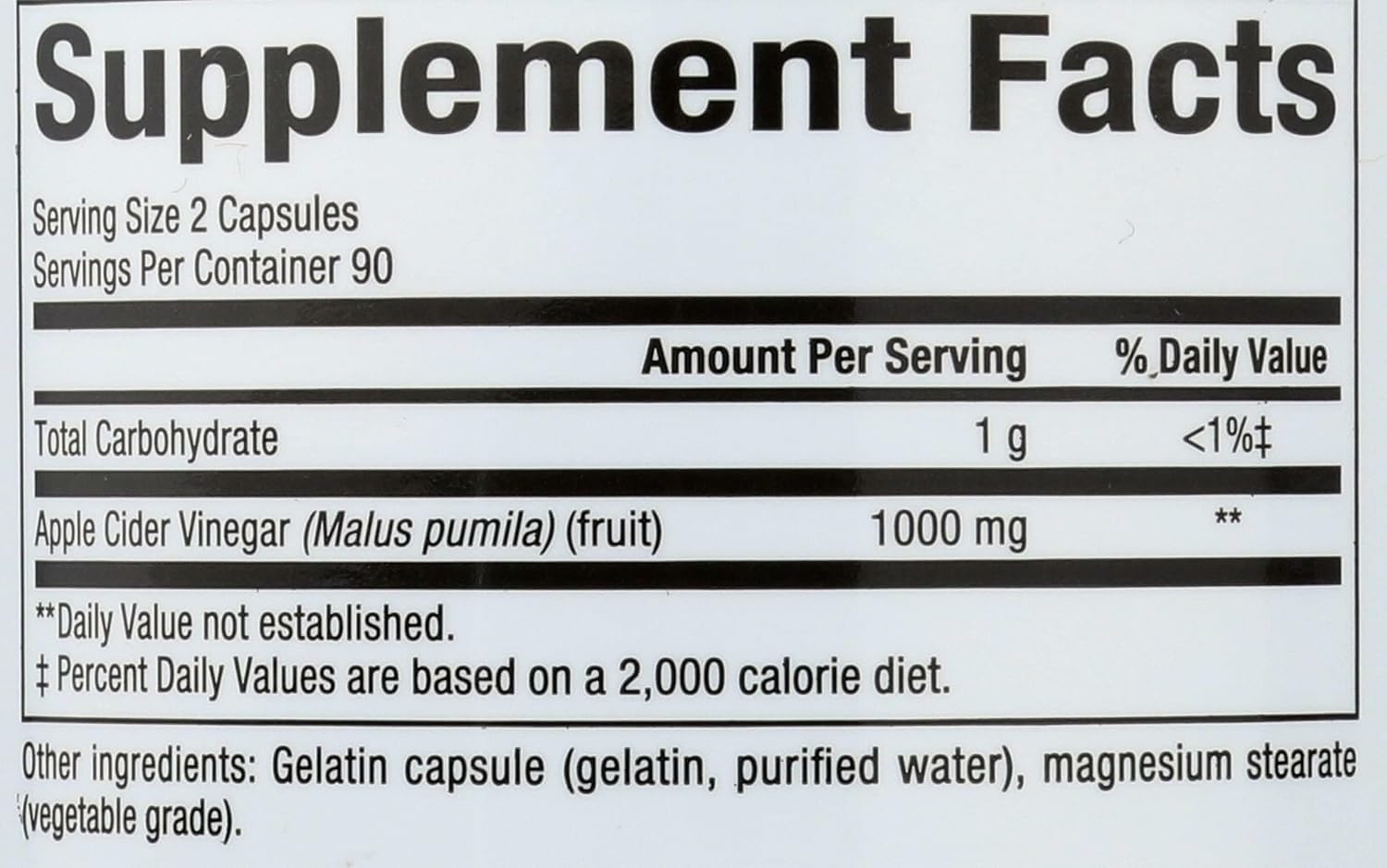 Close-up of apple cider vinegar capsules