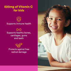 Kids holding a chewable Vitamin C 500 mg wafer