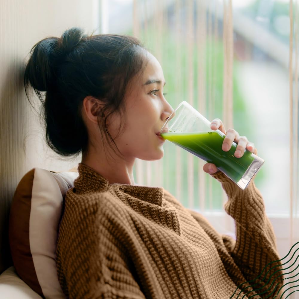 Close-up of green moringa powder texture