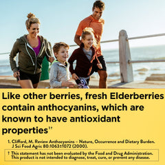 Close-up of Nature Made elderberry immunity gummies with Vitamin C and Zinc.