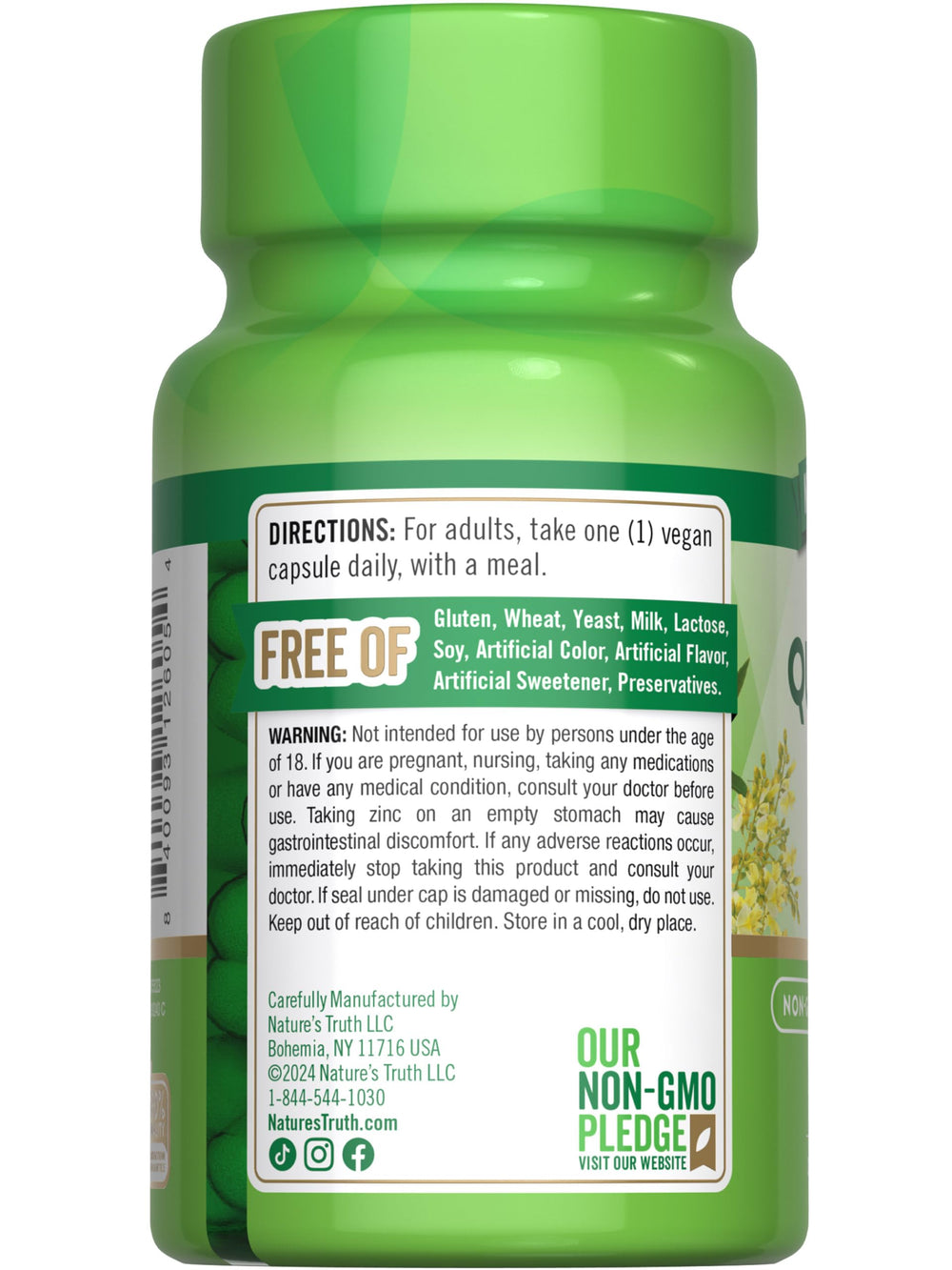 Bottle and capsules displayed on a white background