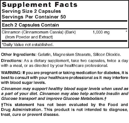 Cinnamon supplement bottle with capsules on a white background