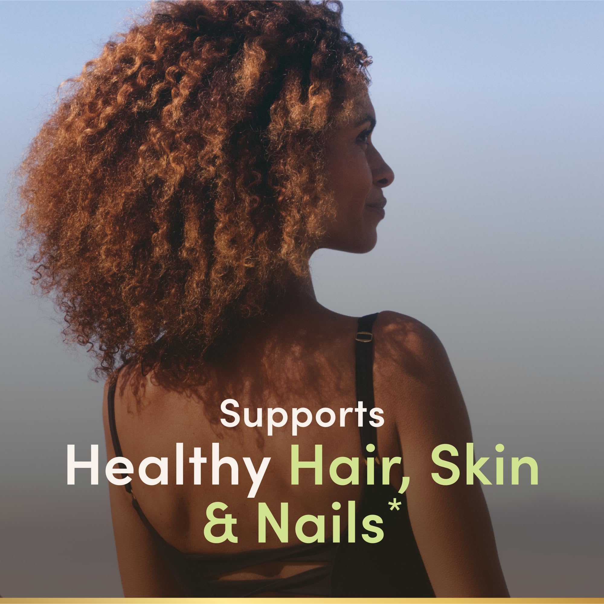 Nature's Bounty Biotin bottle on white background