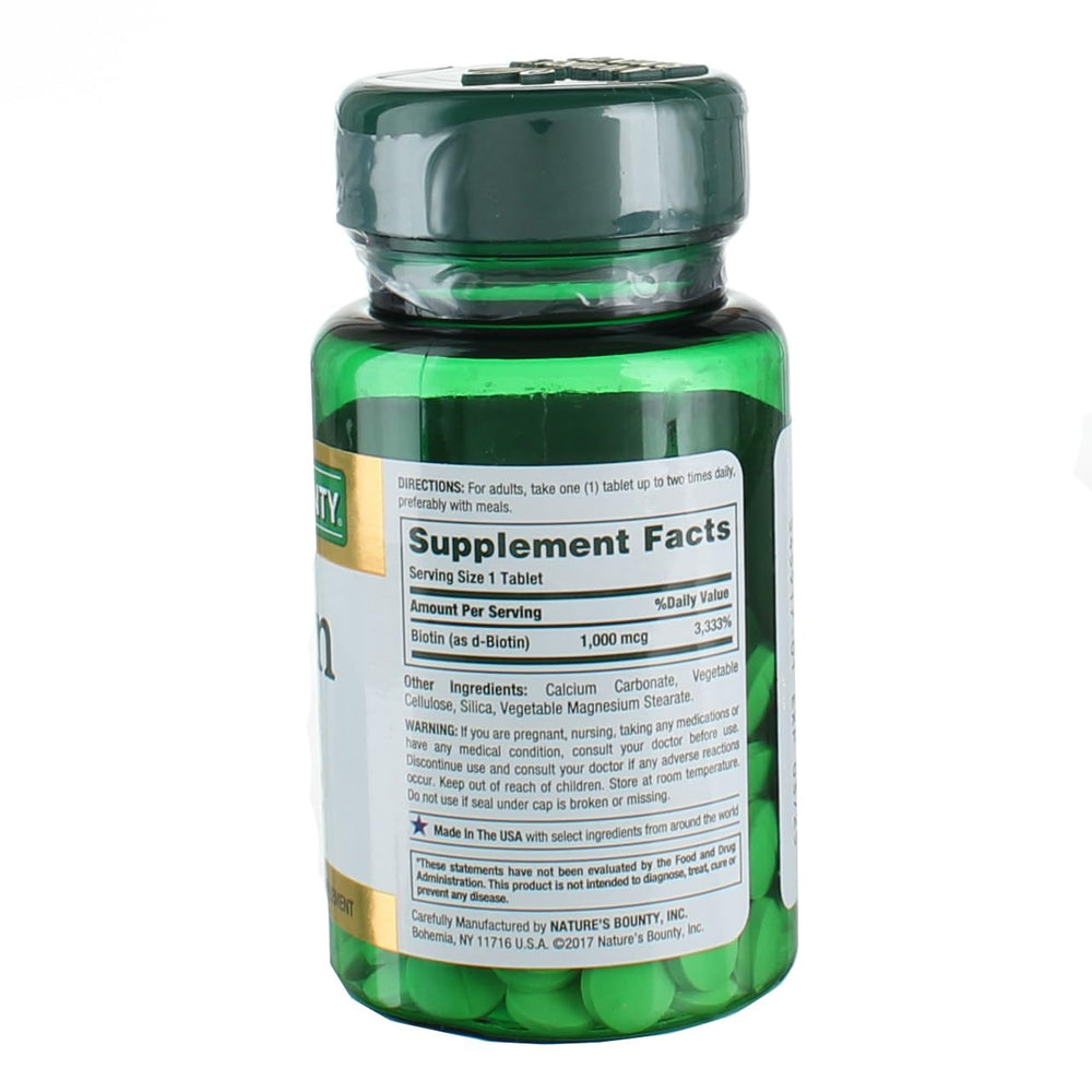 Bottle of Nature's Bounty Biotin 1000 mcg with label visible