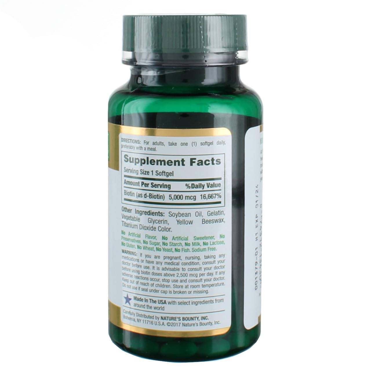 Close-up of Nature's Bounty Biotin 5000 mcg Liquid Softgels bottle