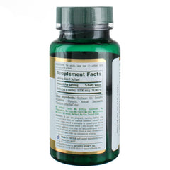 Close-up of Nature's Bounty Biotin 5000 mcg Liquid Softgels bottle